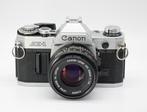 Canon AE-1 + 50mm 1:1.8 FD Analoge camera, Audio, Tv en Foto, Nieuw