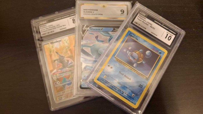 Pokémon - 3 Graded card - Squirtle, Glaceon, Mimikyu Foil,, Hobby en Vrije tijd, Verzamelkaartspellen | Pokémon