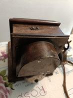 Analoge telefoon - Hout, ijzer en bakeliet uit 1910