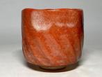 Aka Raku Chawan — Warmte in de winter, een vat van