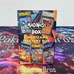 Madness Mystery Box - Charizard Graded Card + 2 Boosterpacks, Hobby en Vrije tijd, Nieuw