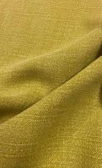 Weefsel met een middel- tot grof korrelige textuur en een