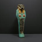 Replica van het oude Egypte Ushabti-beeld met ramshoofd.