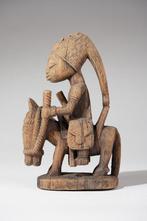 Een houten beeldhouwwerk - Yoruba - Nigeria (Zonder