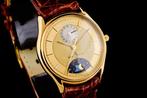 Baume & Mercier - 18K Gold Moon Phase Quartz Slim - NO, Handtassen en Accessoires, Horloges | Heren, Nieuw