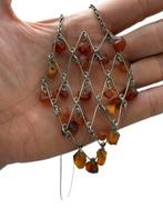 Curieuze en sensuele vintage halsketting van amber, ruw