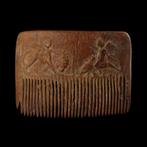Oud-Romeins Been Comb toont Leeuw en Amor