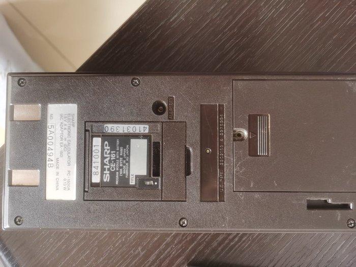 Sharp PC-1500A Pocket Computer - Rekenmachine - 1980-1990 -, Games en Spelcomputers, Spelcomputers | Overige Accessoires