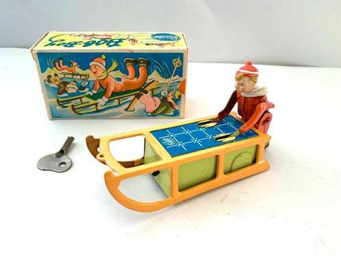 Gescha - Blikken speelgoed - Bob-Boy Boy on sled - No., Antiek en Kunst, Antiek | Speelgoed