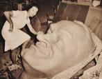 UPI - Hungarian sculptress Magda puts the finishing touches