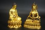Two gilded bronze statues, Vairocana Buddha and Amitabha