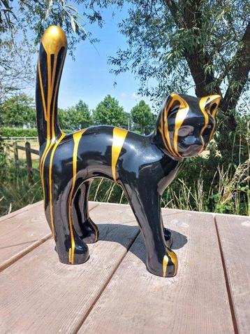 Statue, garden statue cat color black with gold paint color