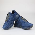 Gucci - Gucci Embossed GG Rhyton Sneakers in Blue – Made in