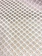 Fluwelen jacquard met een klein, regelmatig geometrisch