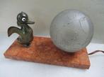 Lampe - Art Déco. Statuette métal. Canard. Globe verre 1935