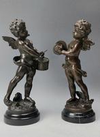 After L. & F. Moreau - sculptuur, 2 Putti met cymbalen en