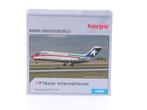 Schaal 1:500 Herpa 514415 Texas International Douglas DC-..., Ophalen of Verzenden, Zo goed als nieuw