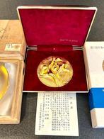 Gouden en bronzen medaille, gouden beker bij de Olympische, Nieuw