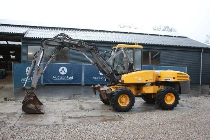 Veiling: Wielgraafmachine Mecalac 12 MX Diesel 56kW 2000, Articles professionnels, Machines & Construction | Grues & Excavatrices