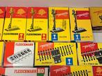 Fleischmann - 32 stuks rail, wissel,sein en regelkast dozen., Hobby en Vrije tijd, Modeltreinen | H0, Nieuw