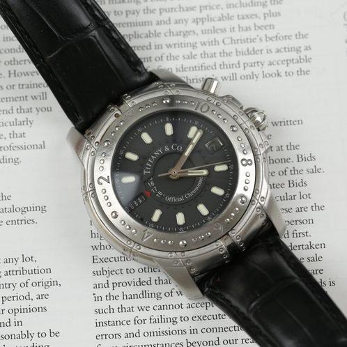 Tiffany & Co. - Streamerica - world time - M141 - Heren -, Handtassen en Accessoires, Horloges | Heren