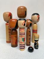 Een prachtige verzameling vintage Kokeshi in verschillende