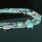 Rodocrosite, améthyste, larimar, pierre de lune, quartz,