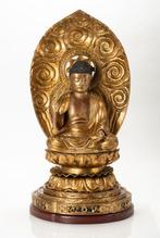 An important and excellent lacquered-wood seated Figure of