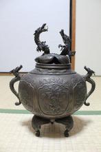 Large and very fine tripod censer with dragon design, signed