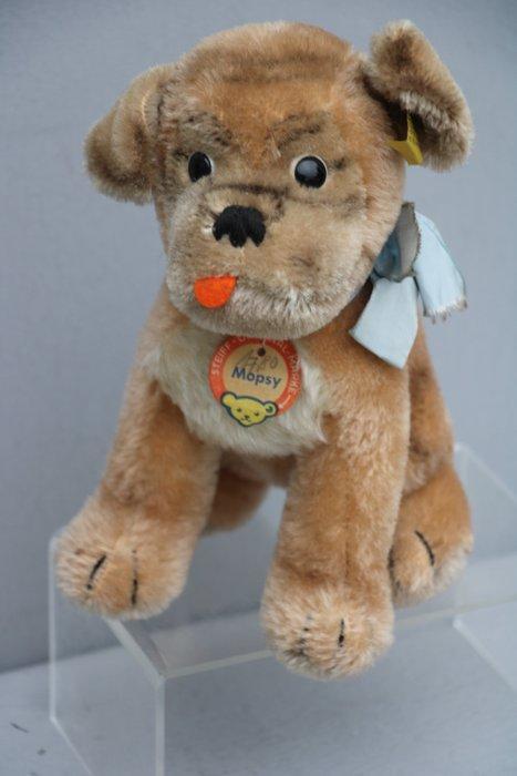 Steiff: Mopsy de hond EAN 3322.00, 1960 - Figuur - mohair, Antiek en Kunst, Antiek | Speelgoed