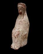 Oud-Grieks Godin Persephone zittend op een troon