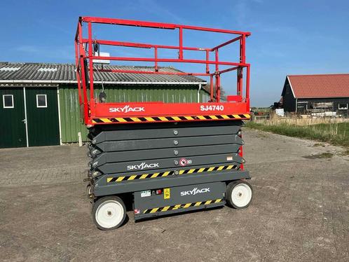Veiling: Schaarlift Skyjack SJ-III 4740 Elektrisch 13.8m 201, Zakelijke goederen, Machines en Bouw | Liften, Steigers en Ladders