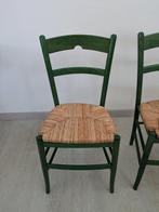 Chaise - Bois - Quatre chaises au siège en paille tressée.