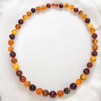 Baltische barnsteenketting: Tijdloze elegantie en, Verzamelen, Mineralen en Fossielen