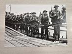 AFP - US troops disembark on the beaches of Normandy during