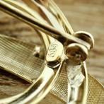 Gouden fantasie broche; Krul, Handtassen en Accessoires, Broches, Ophalen of Verzenden, Gebruikt, Overige kleuren, Goud