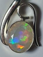 Unieke facetgeslepen opaal hanger met de hand gemaakt in