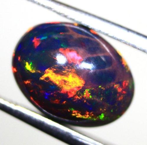 Cts. 2.40 Natuurlijke Ethiopische zwarte opaal Cabochon -, Verzamelen, Mineralen en Fossielen