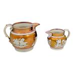 Staffordshire pink copper lustreware pair of jugs with