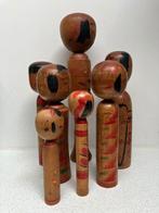 Een prachtige verzameling vintage Kokeshi in verschillende