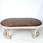 exceptional wood sculpted coffee table with faux-marble top