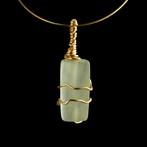 Oud-Romeins Hanger met met draad omwikkelde Romeinse