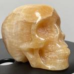 calciet Oranje calciet schedel - Hoogte: 13.7 cm - Breedte:, Verzamelen, Mineralen en Fossielen