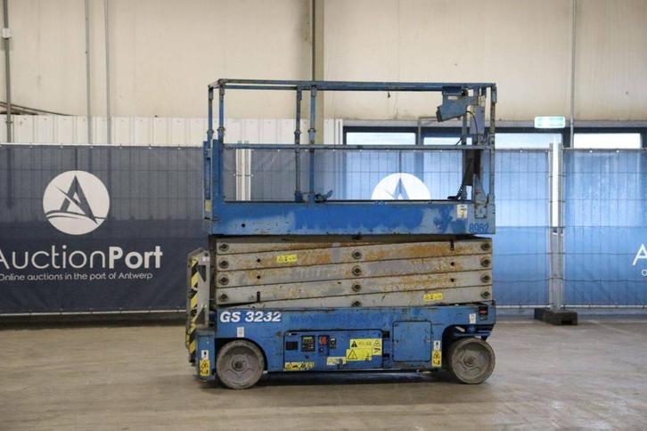 Veiling: Schaarlift Genie GS-3232 Elektrisch 11.75m 2016, Zakelijke goederen, Machines en Bouw | Liften, Steigers en Ladders, Ophalen