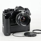 Nikon FE black + Nikkor 2/50mm + MD-12 | Appareil photo, Audio, Tv en Foto, Fotocamera's Analoog, Nieuw