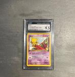 Pokémon - 1 Graded card - Team Rocket - 1st edition - 49/82, Hobby en Vrije tijd, Verzamelkaartspellen | Pokémon, Nieuw