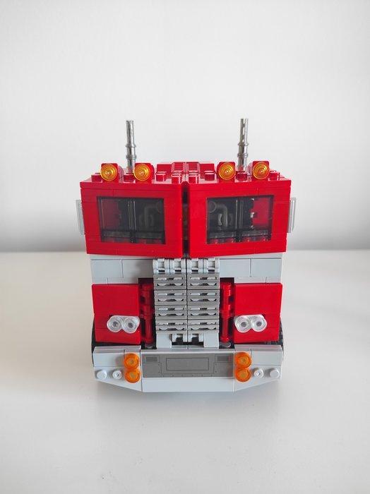 1:20 - Modelauto - Optimus Prime (camión/robot) Coche-robot, Antiek en Kunst, Antiek | Overige Antiek