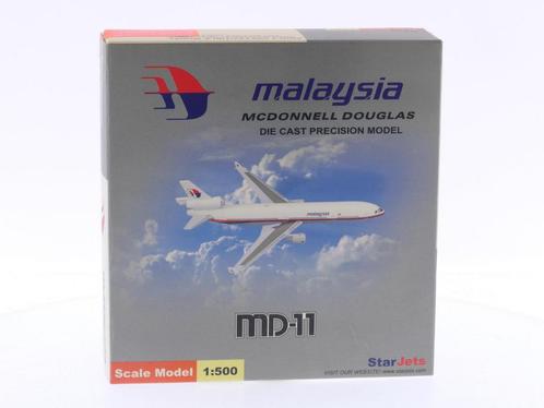 Schaal 1:500 Schuco/Star Jets SJMAS031Malaysia Airways Mc..., Hobby en Vrije tijd, Modelbouw | Vliegtuigen en Helikopters, Gebruikt