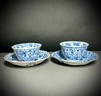 NO RESERVE - een paar Chinese blauw-witte gegoten koppen en, Antiek en Kunst