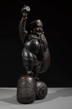 Brons - Een grote bronzen okimono van Daikokuten  met